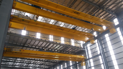 overhead cranes at different heights